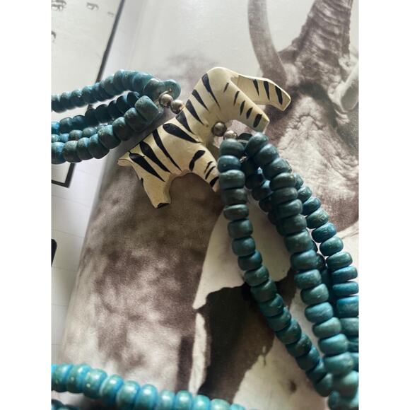 Necklace with wooden animals and beads - Picture 4 of 8